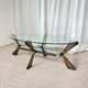 Vintage Italian coffee table in glass, chrome and brass metal, Hollywood Regency style, 1970s.