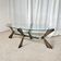 Vintage Italian coffee table in glass, chrome and brass metal, Hollywood Regency style, 1970s.
