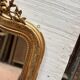 Louis XV style mirror in gilded wood and stucco, 20th century.