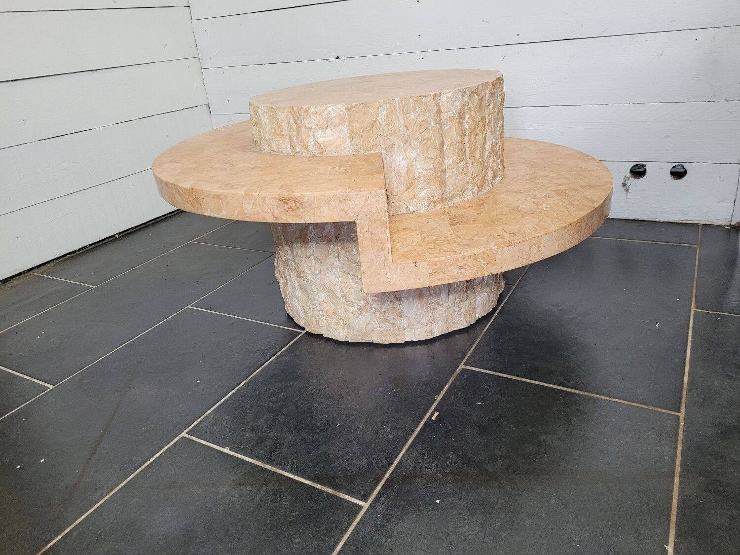 Round stone coffee table by Magnussen Ponte