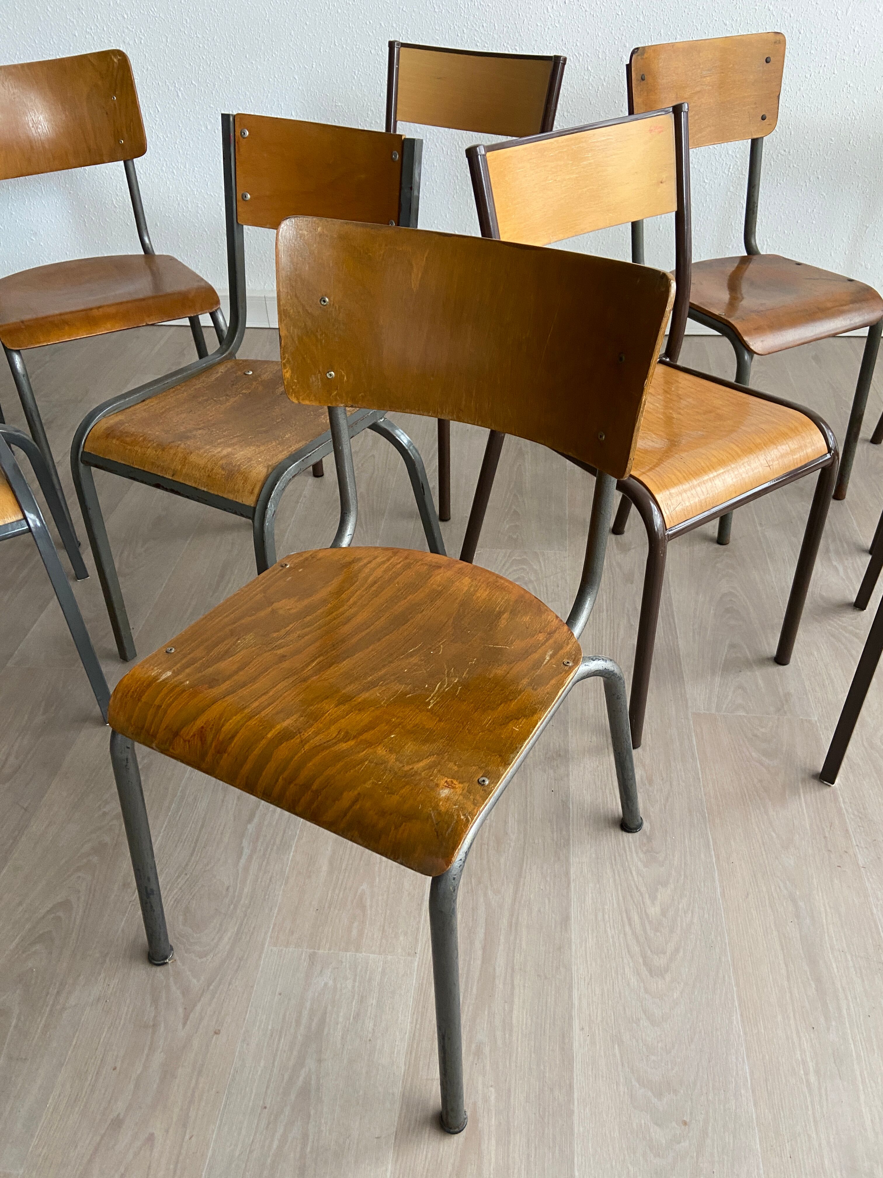 Set of 10 mismatched industrial chairs vintage mullca