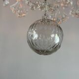 Bronze cage chandelier adorned with molded glass pendants in the shape of peacock feathers, circa 1800
