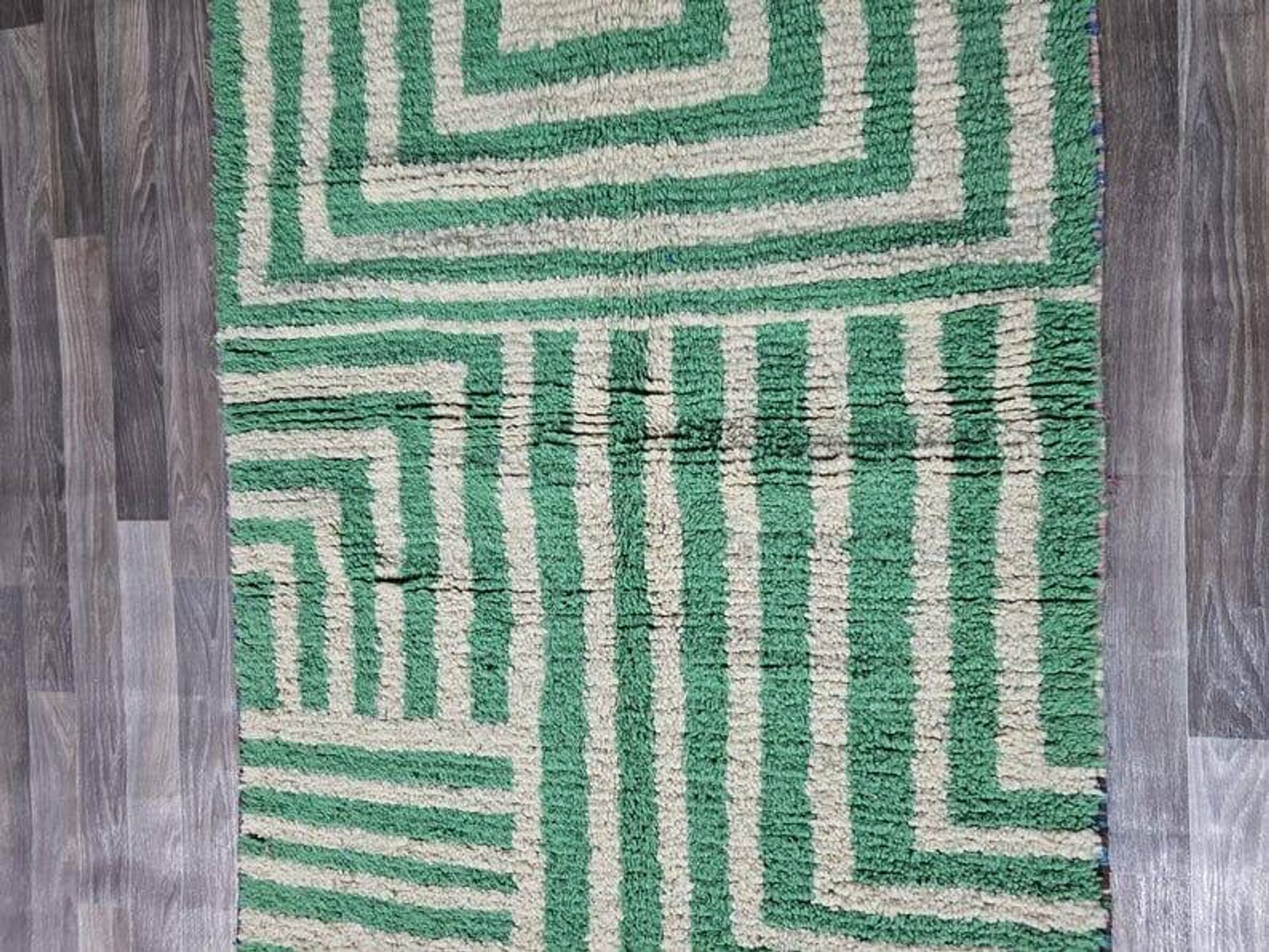 Handmade natural wool rug, size 140 x 260 cm.