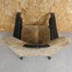 Old armchair upholstered in velvet, carved and caned wood