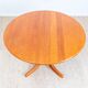 1970s solid teak dining table with Scandinavian design.
