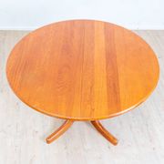 1970s solid teak dining table with Scandinavian design.