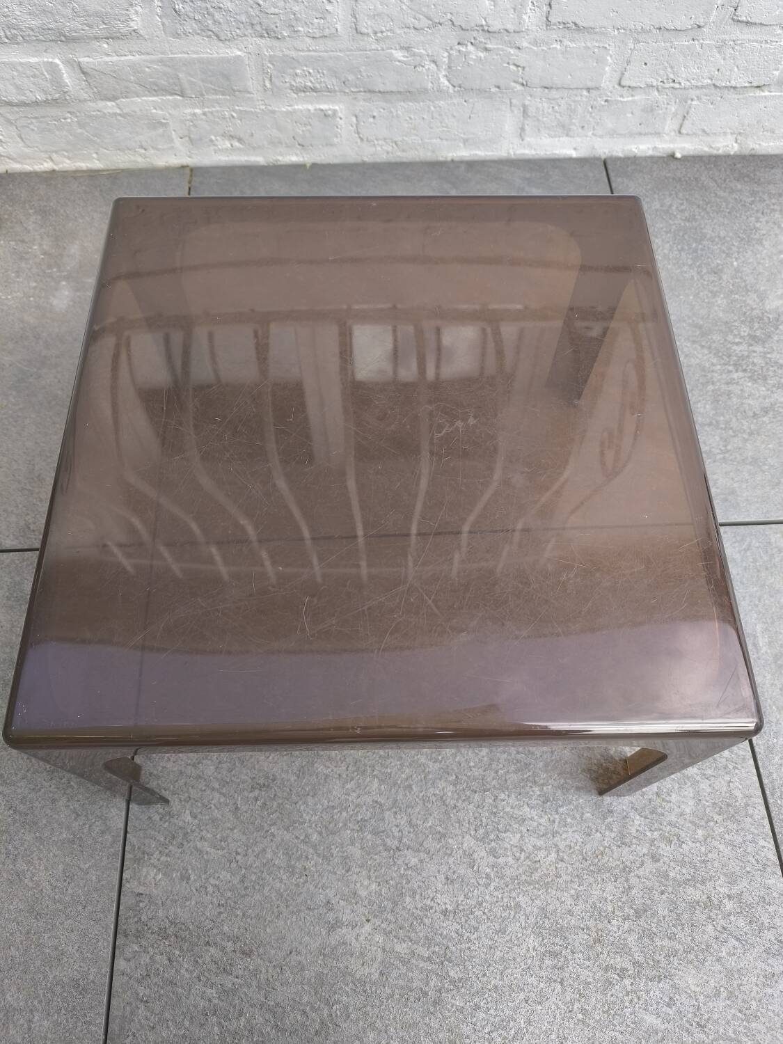 Smoked plexiglass side table
