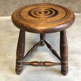 Tabouret tripode rond en bois foncé