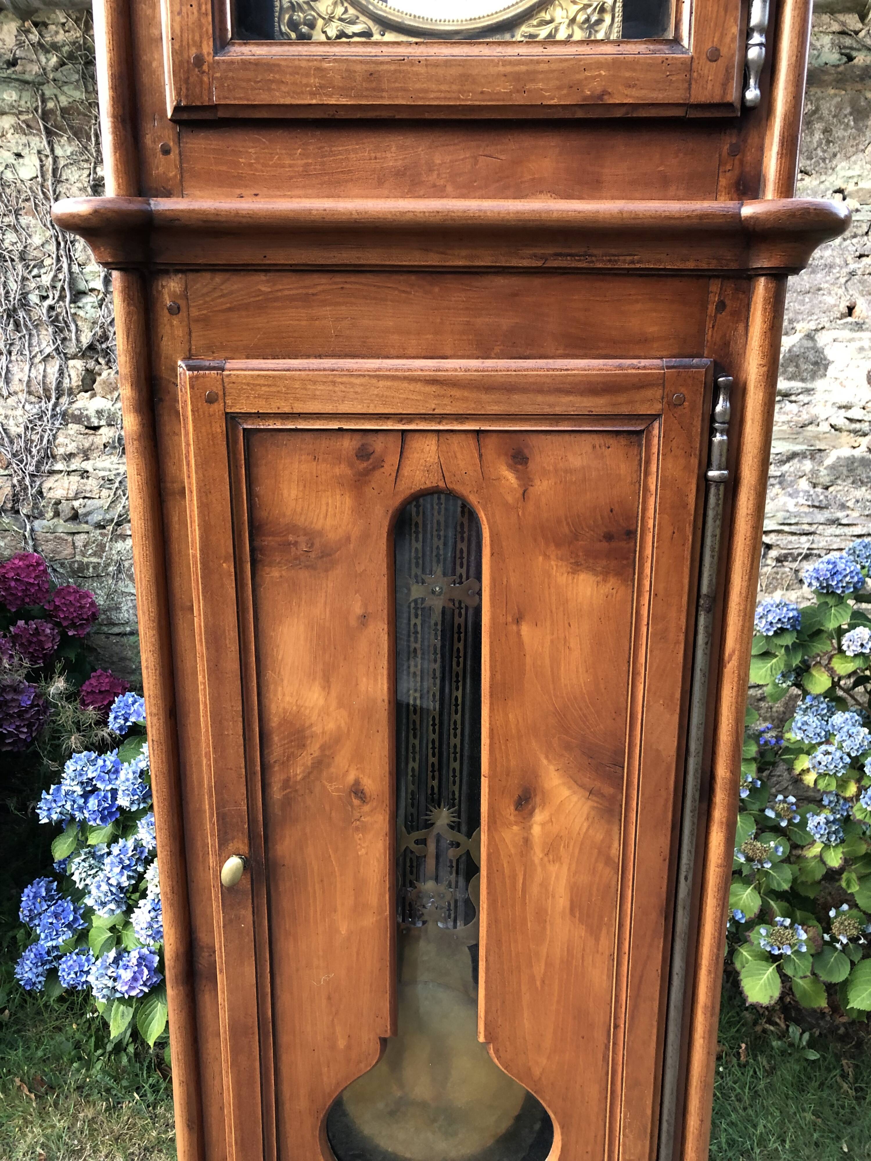 Comtoise clock in cherry style Louis XV period 19th region Fougères.