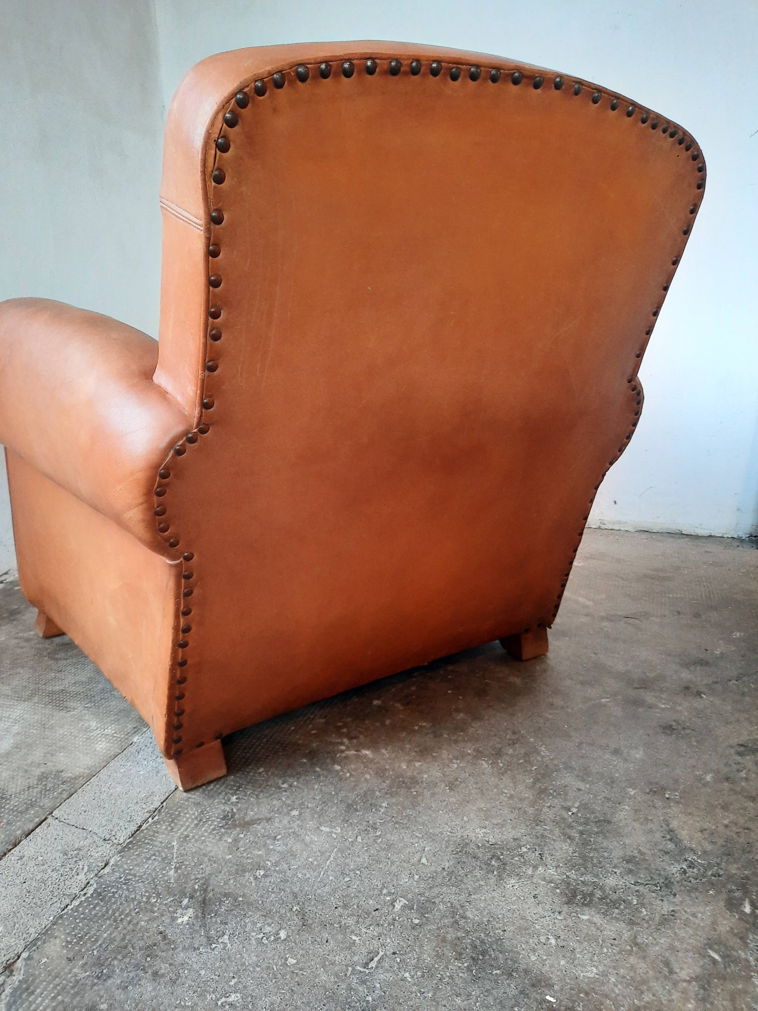 Old leather club chair 1940-1950