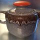 A teapot set and its vintage DDR-Germany sugar maker from the 1960s