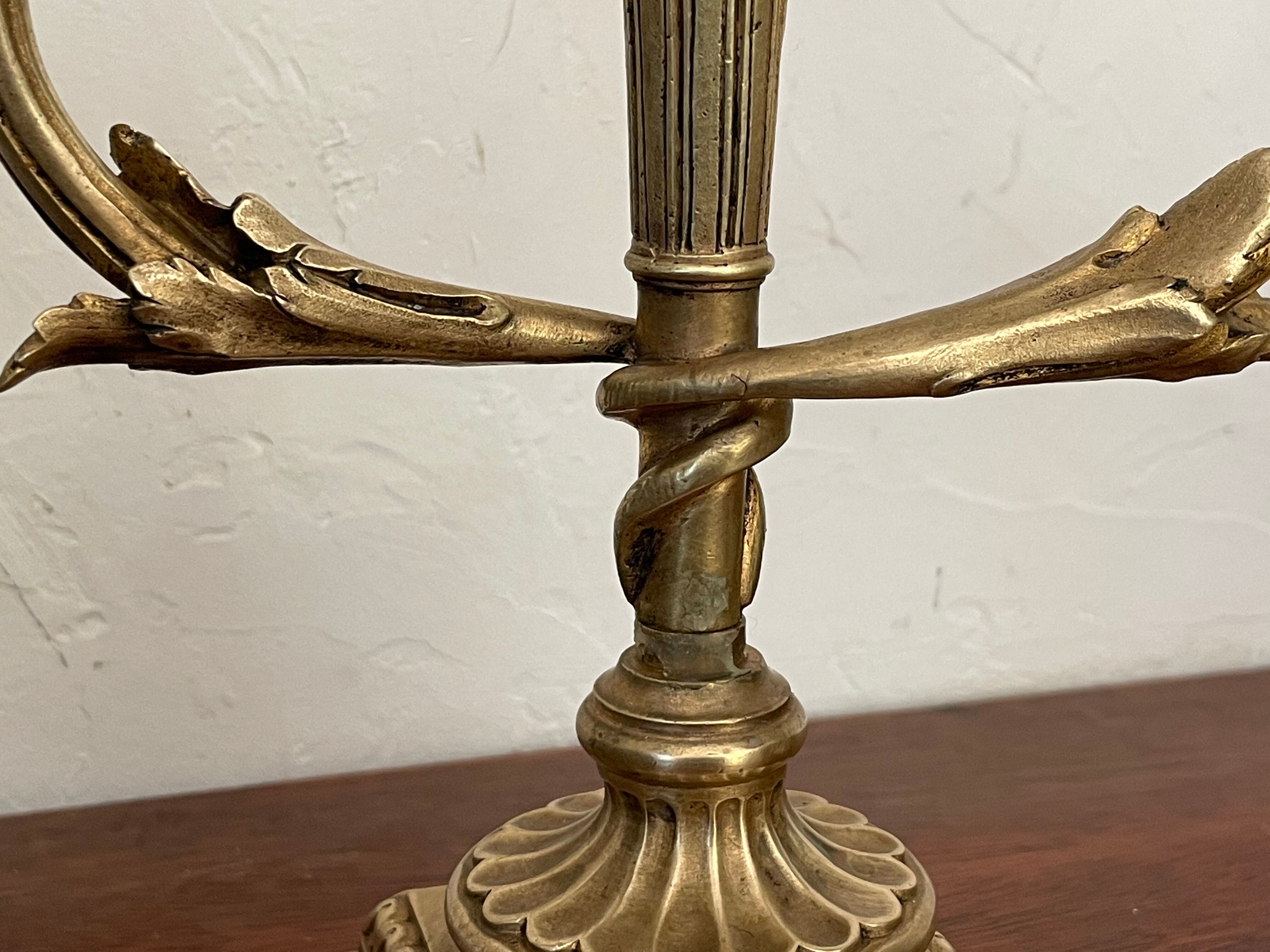 Pair of candle holders in gilded bronze nineteenth century