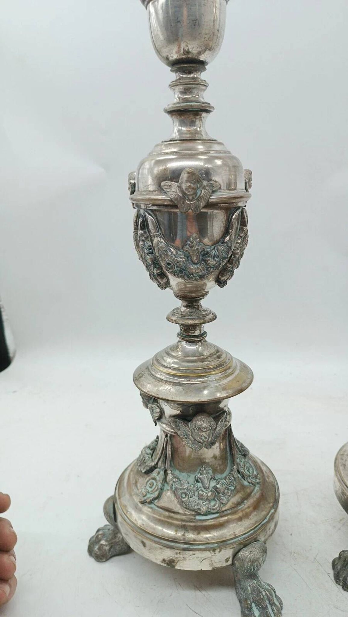 Pair of silver-plated bronze candlesticks in the Empire style, early 19th century, height 70 cm