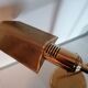 Golden metal reading lamp 2 articulated arms