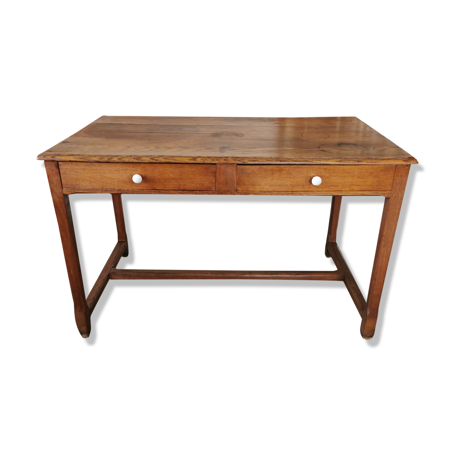 Table in raw oak, countryside.