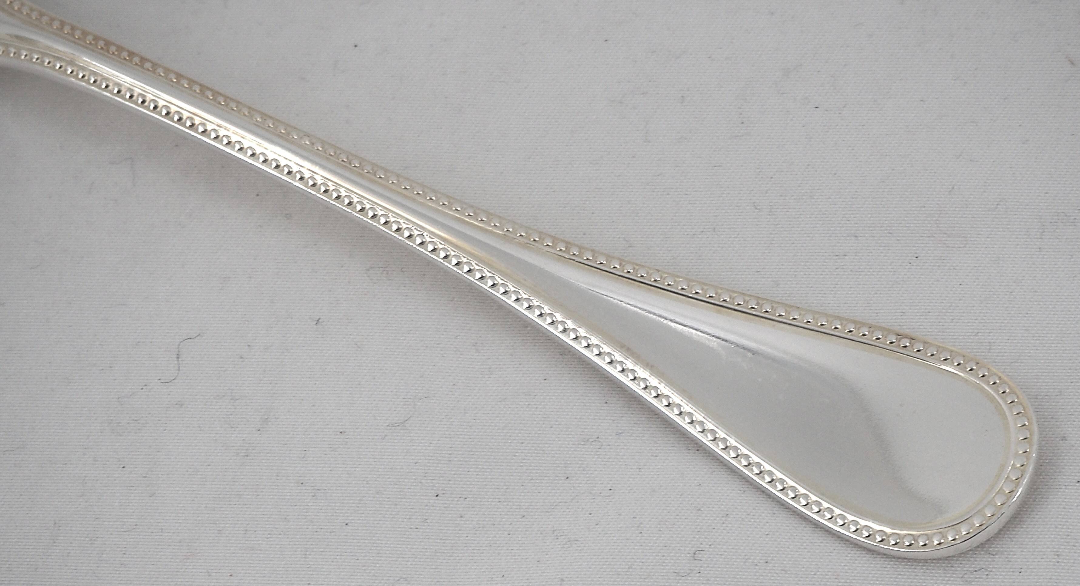 Christofle Perles 12 silver-plated cake forks, excellent condition.