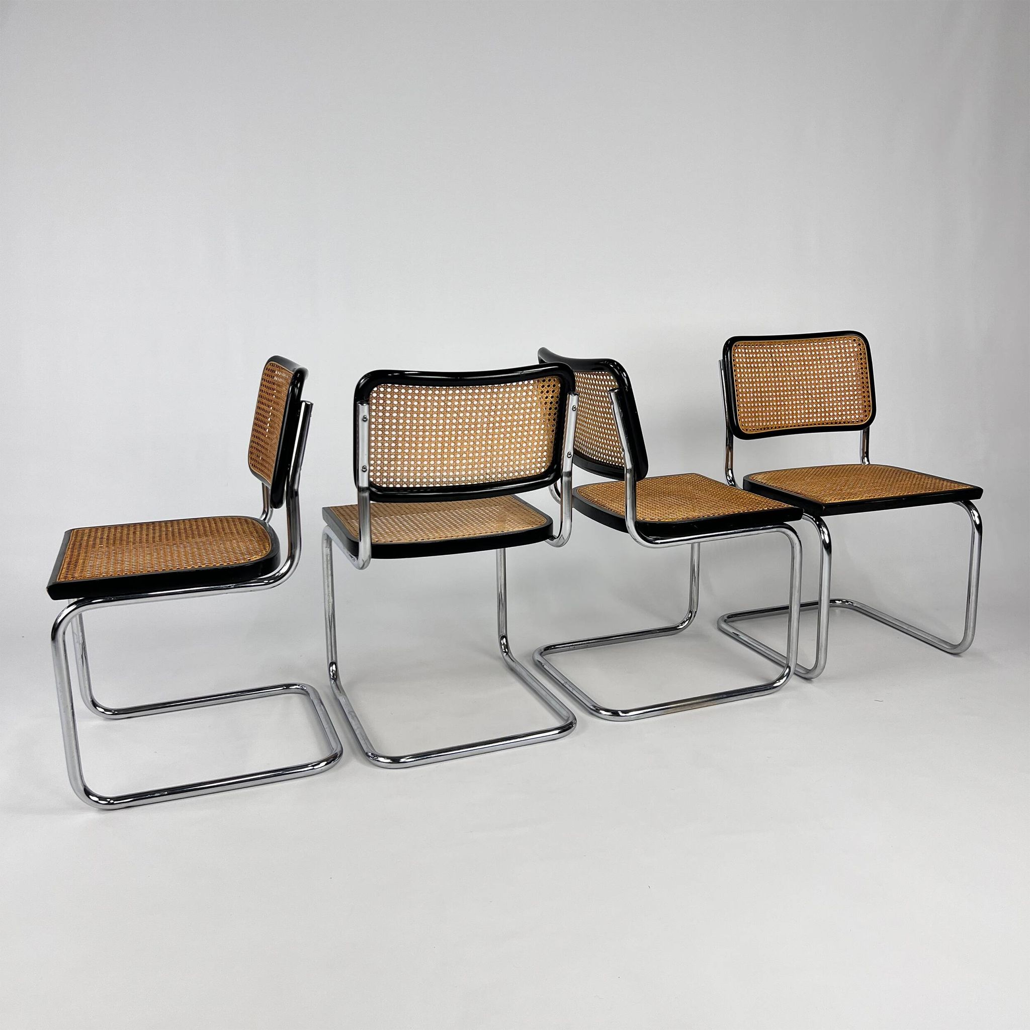 Set of 4 Tubular Frame and Cane Cantilever dining chairs, Italy, 1970s