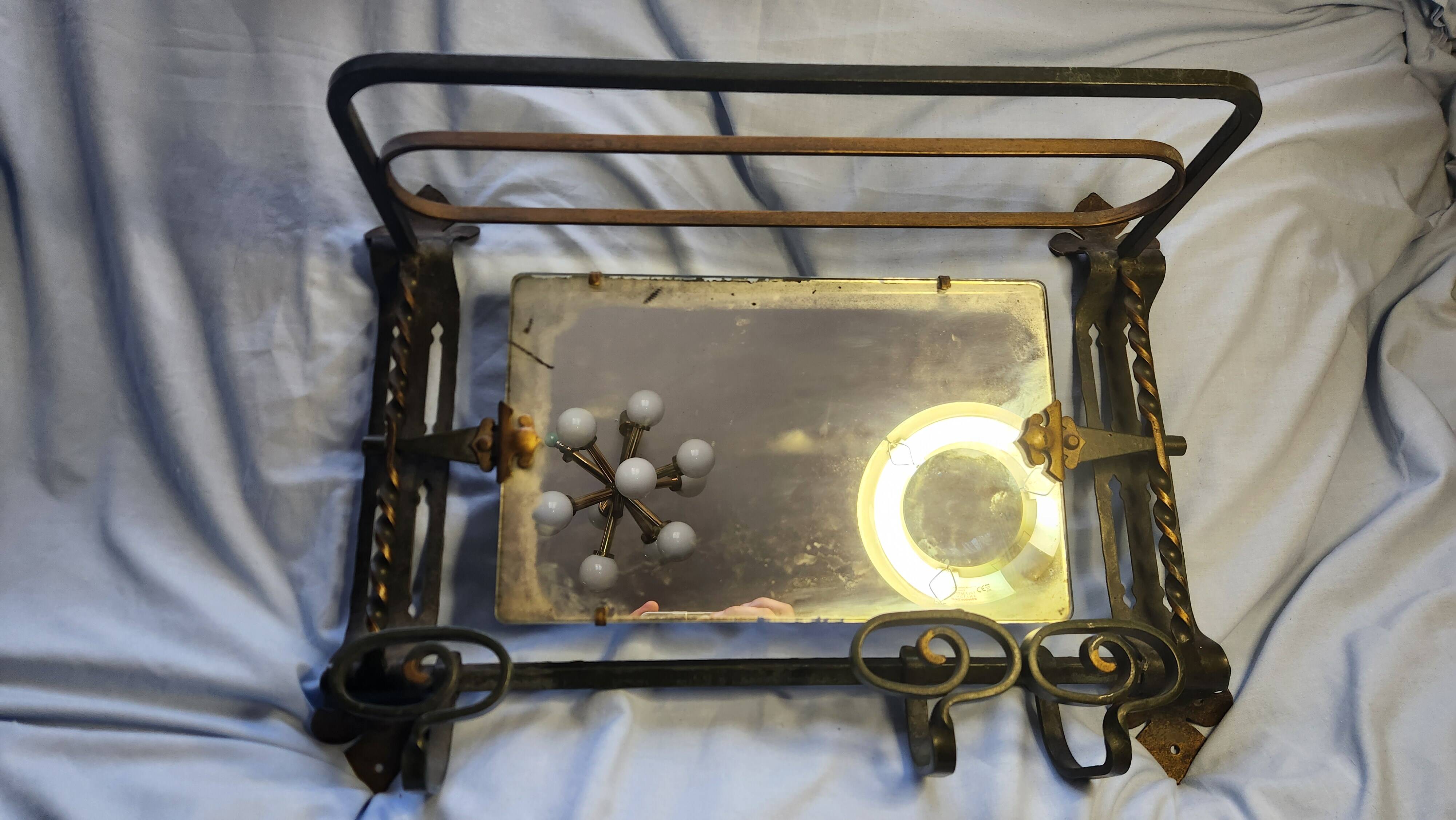 Vintage Art Deco wall-mounted coat and hat rack.