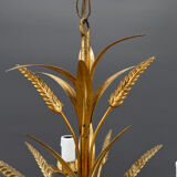 Golden suspension on ears of wheat, circa 1960