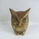 Chiseled brass owl