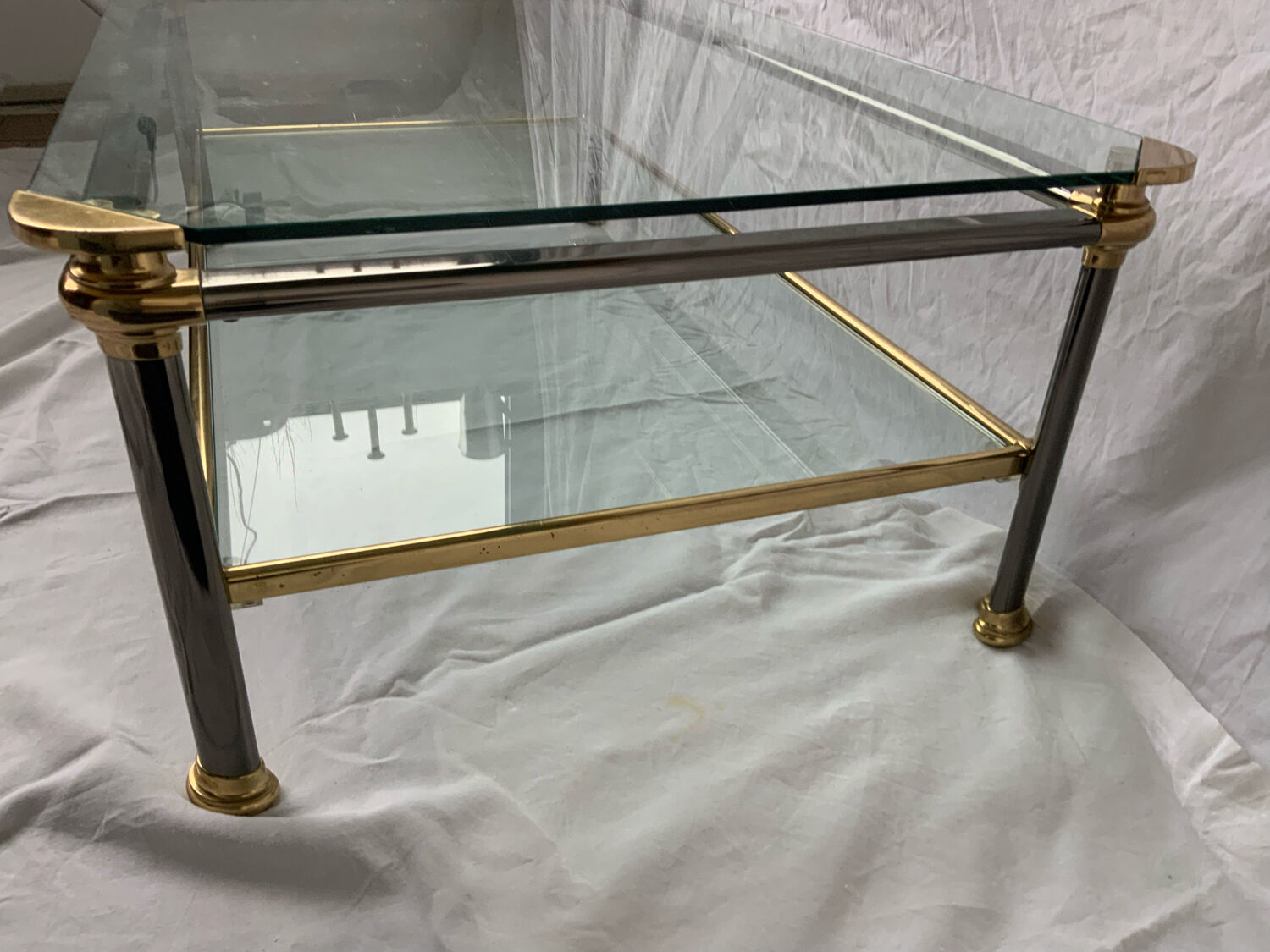 Glass and brass coffee table