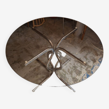Round table in chromed metal and smoked glass