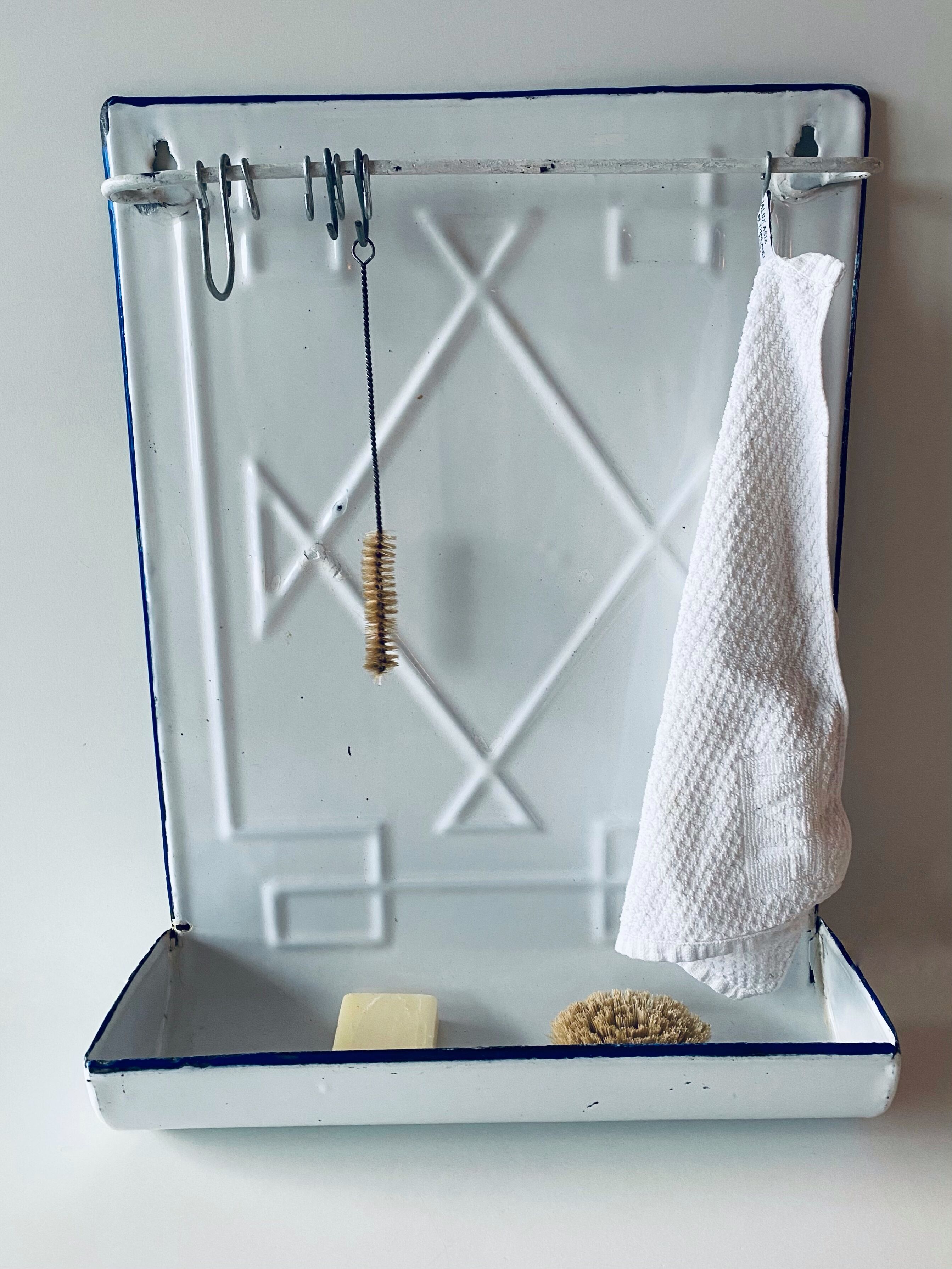 Old enamelled kitchen utensil display