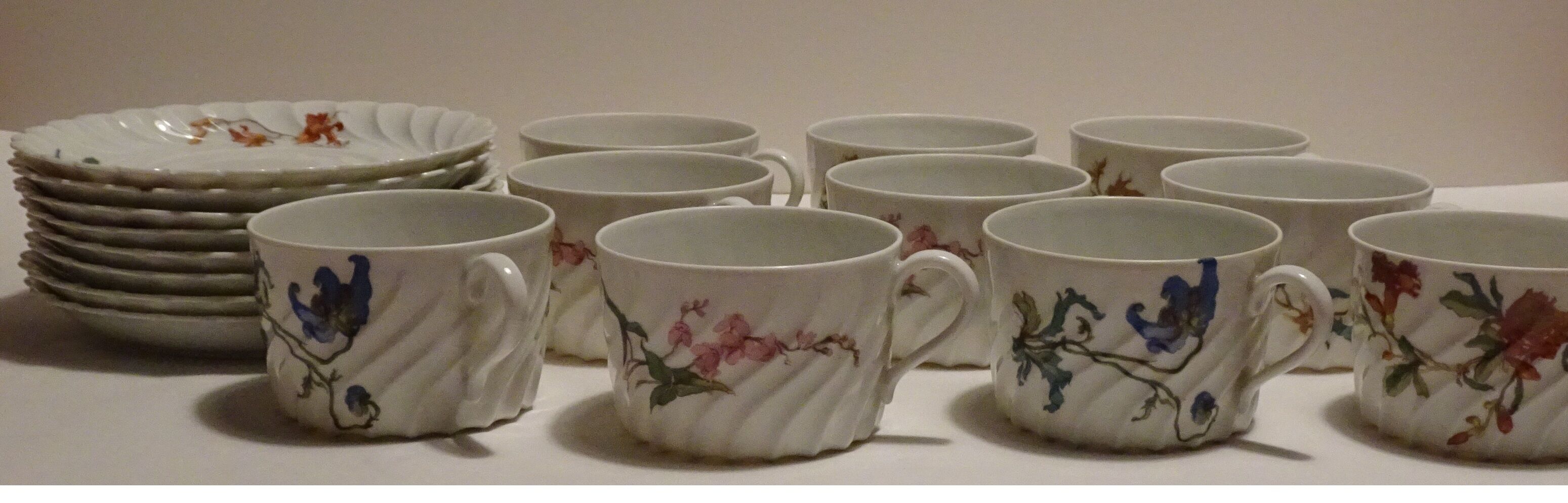 Set of 10 tea cups and eight under cups