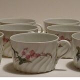 Set of 10 tea cups and eight under cups