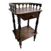 Nightstand, turned wooden bedside table opening with a drawer, vintage telephone table.