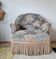 Fauteuil crapaud ancien velours fleuri avec franges