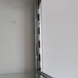 Chrome and glass wall shelf, circa 1960