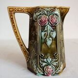 Old art nouveau pitcher in Onnaing slip