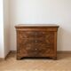 Antique walnut chest of drawers with three drawers.