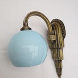 Art deco wall lamp in brass and soft blue opaline globe