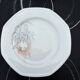 Set of 12 dessert plates in Sologne porcelain.