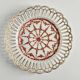 Pair of openwork porcelain plates decorated with roses