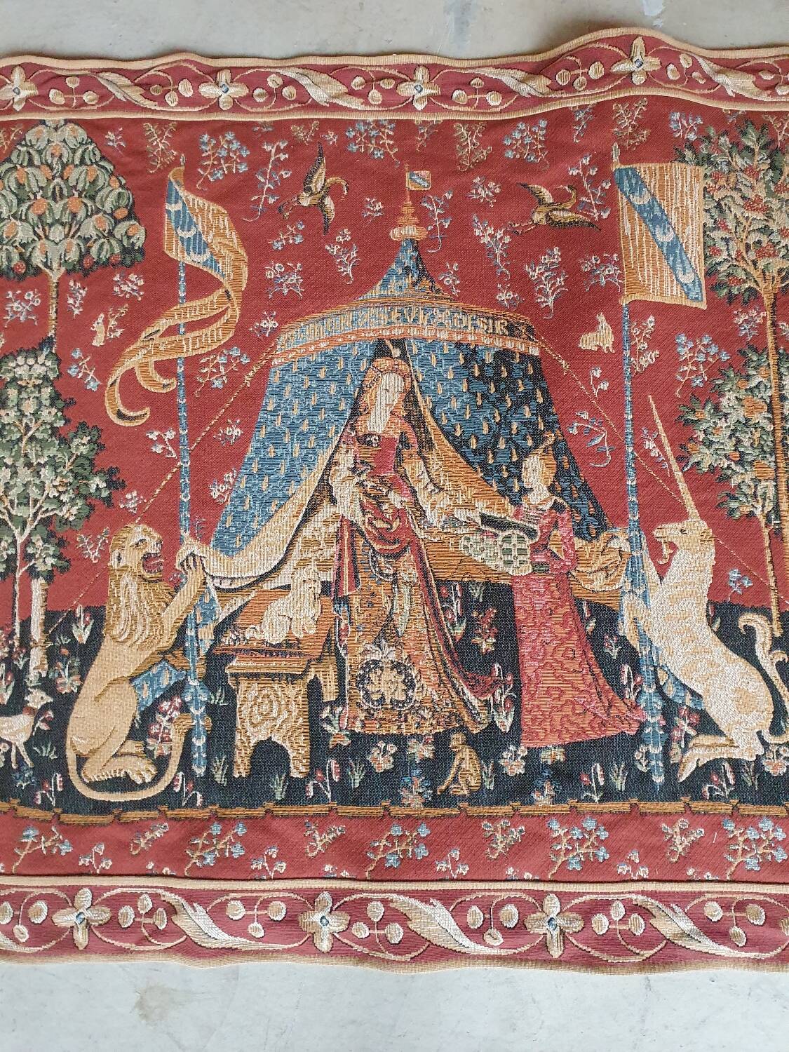 Old tapestry Lady and the Unicorn