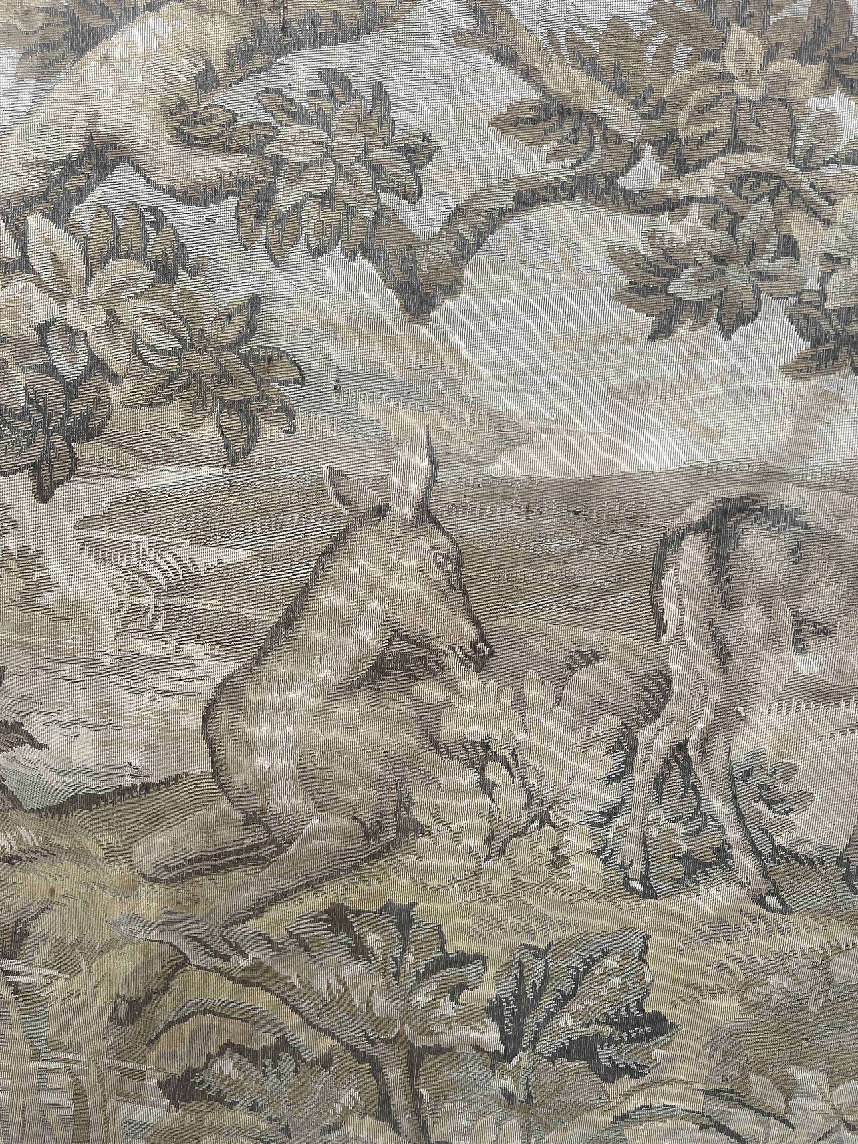 Renaissance-style tapestry with animal motifs, 20th century.