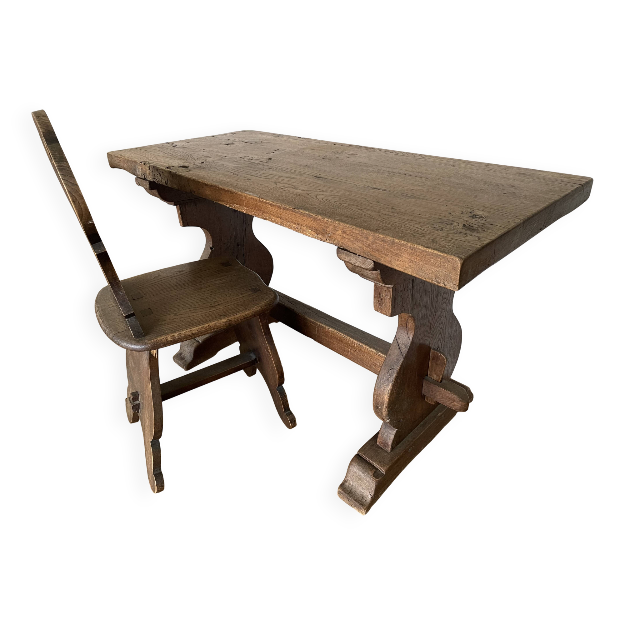 Rustic Spanish table and chair from the late 19th / early 20th century in solid oak.