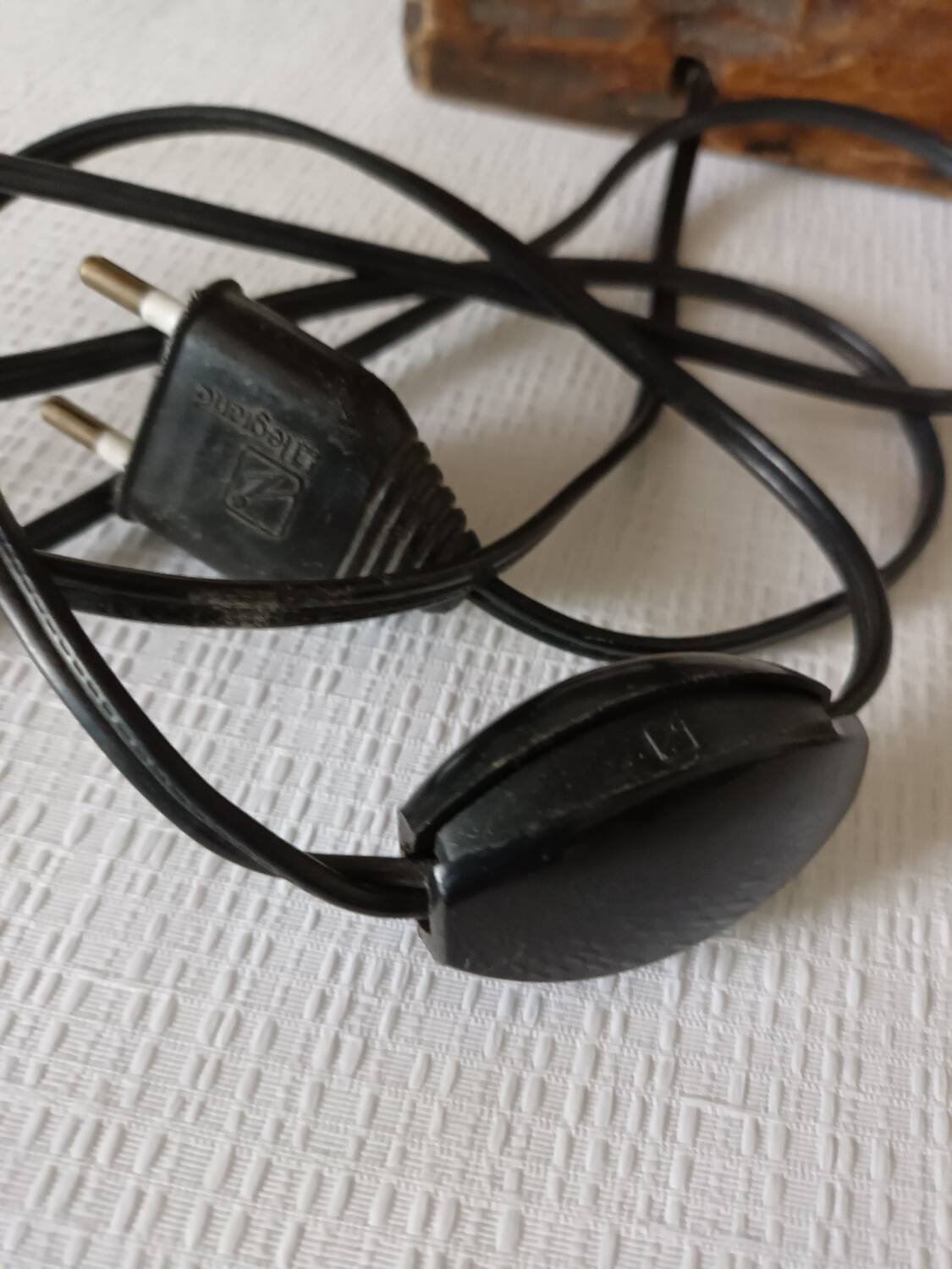 Sculpted wooden table lamp with vintage cord