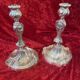 Pair of candlesticks, torches in silver bronze