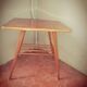 Scandinavian table with compass legs + magazine rack.