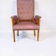Vintage armchair in light brown faux leather, 1960s.