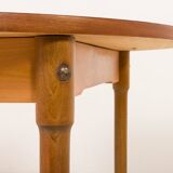Teak round table with hidden extension, 1970s