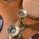 Pair of 19th-century brass pusher candlesticks