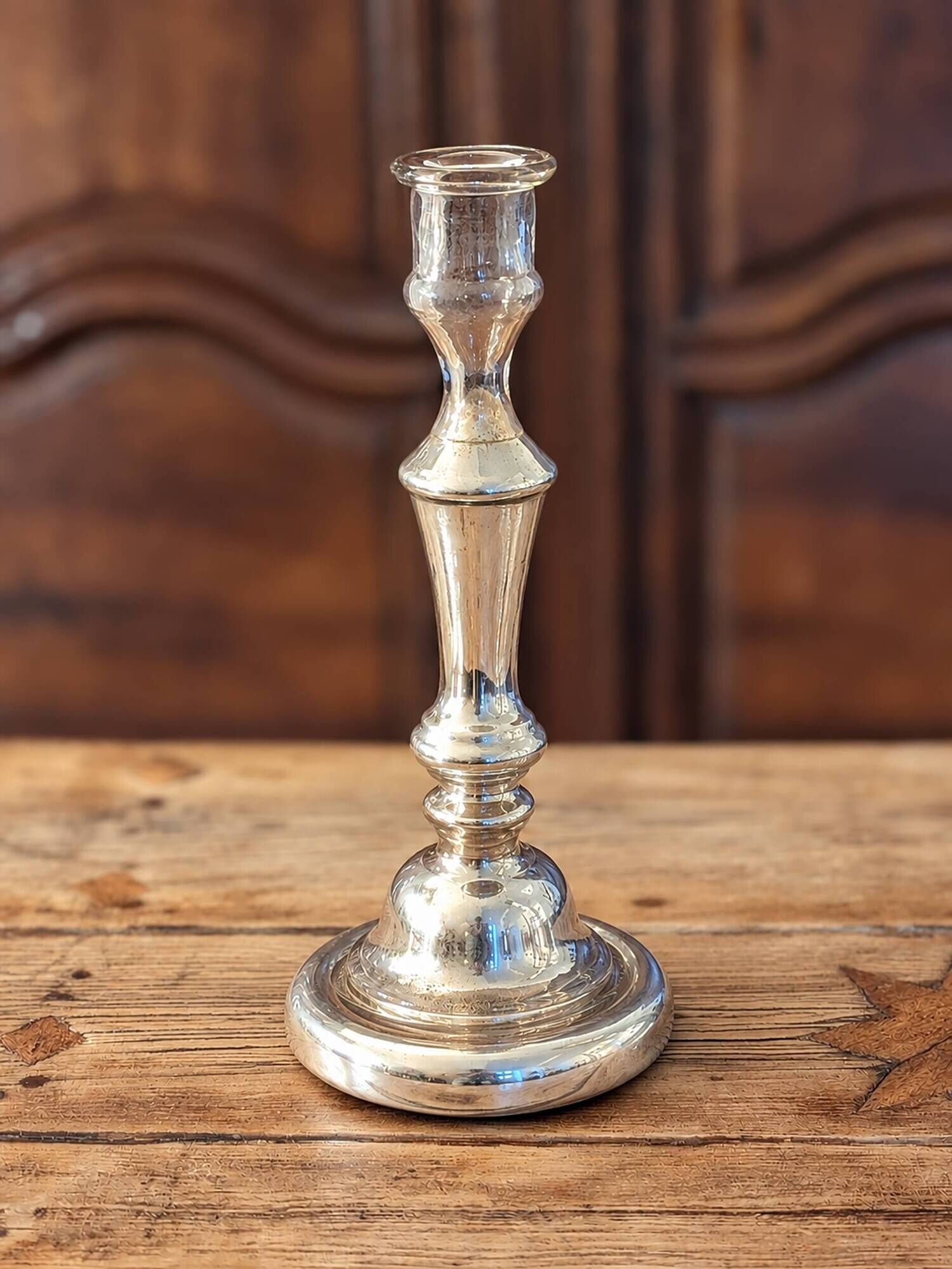 Large mercury glass candlestick from the 19th century.