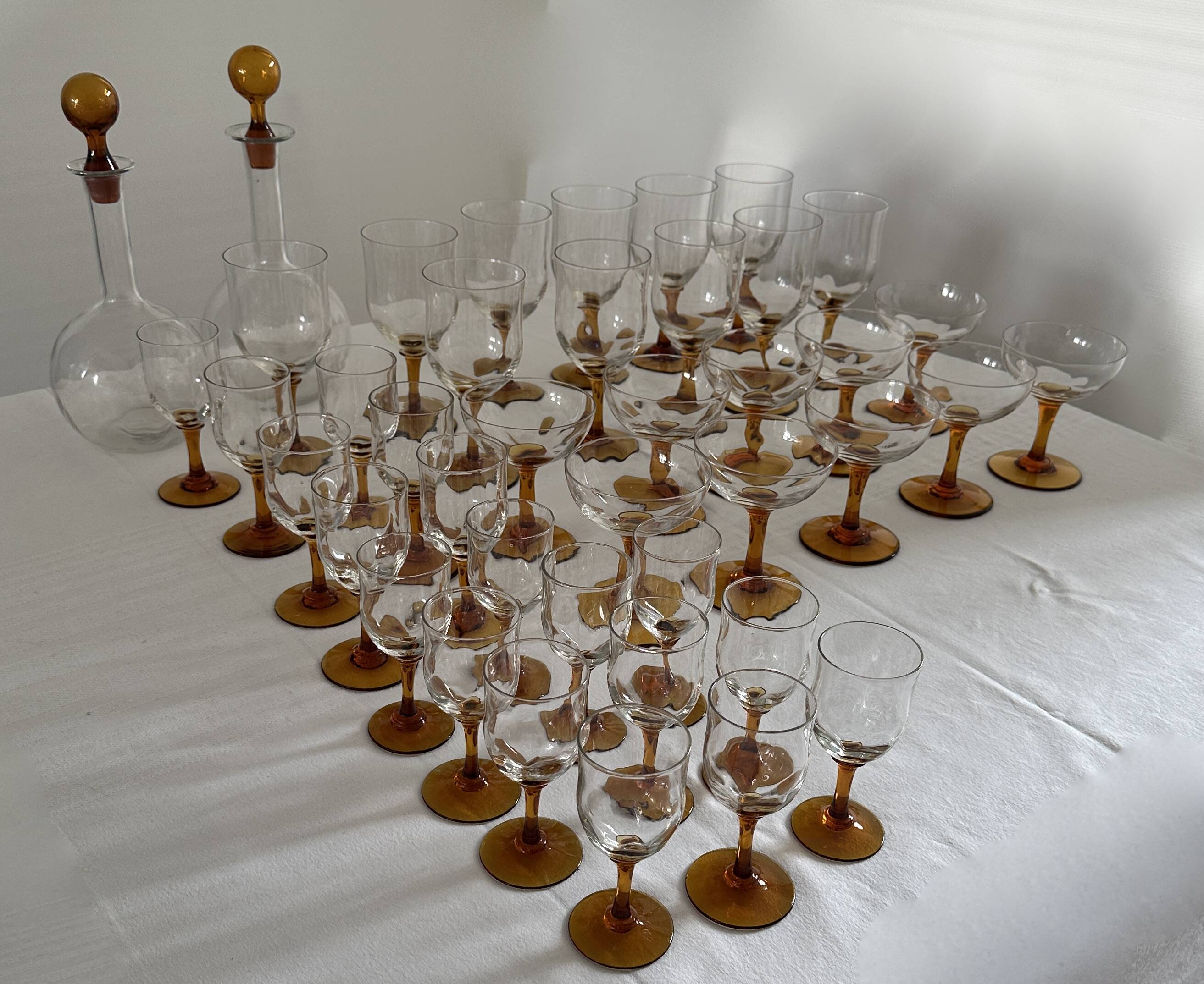 Set of 41 antique glasses with amber stems - water, wine, liqueur, champagne cups.