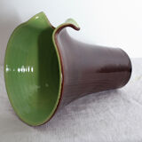 Brown and green vase with open edge rolled up