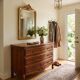 Curved commode in Louis XV style made of cherry wood.